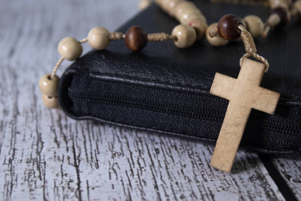 istock bible and old wooden rosary 1612808775