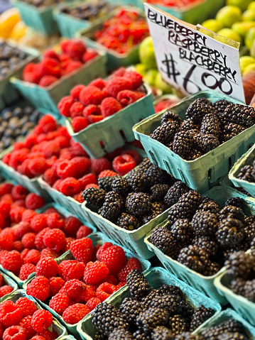 Fresh and tasty berries are for sale at outdoor market in Washington.