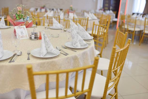 istock the table is set with white plates and silverware to fill it 1612882681