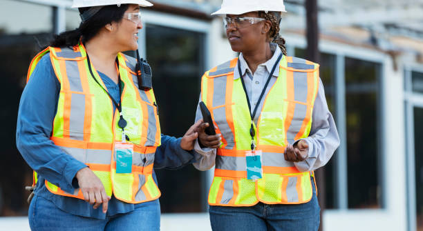 istock Two multiracial female construction workers at job site 1612926564