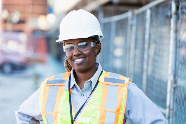 istock Female African-American construction worker outdoors 1612927103