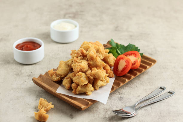 istock Crispy Chicken Popcorn with Spicy Sauce and Mayonaise 1612976476