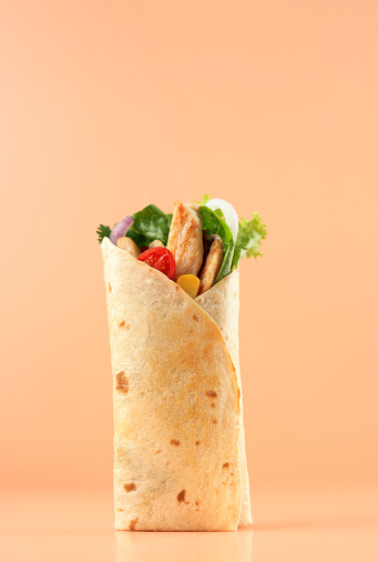 Chicken Tortilla Wrap with Tomato, Corn, and Various Fresh Vegetable, Copy Space for Text