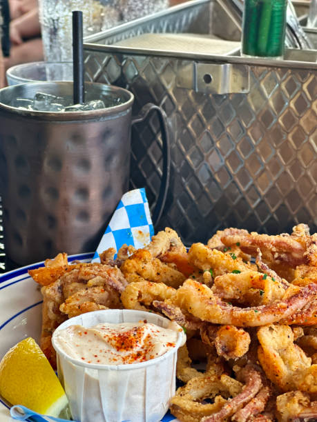 istock Tasty calamari served with a Moscow Mule 1612988542