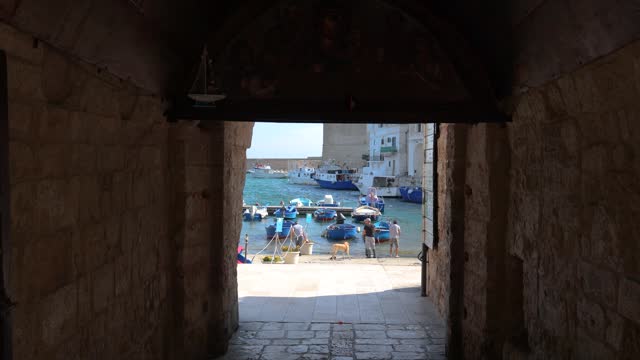 Monopoli harbor archway alley, Puglia