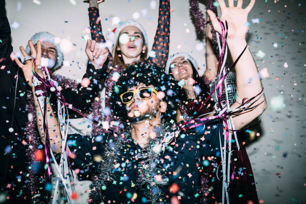 Confetti falling over a group of people dancing