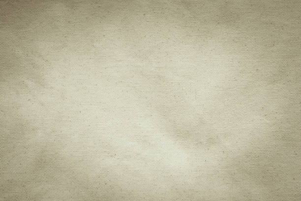 istock Hessian sackcloth woven texture pattern background in grunge old aged light cream beige brown color 1613017075