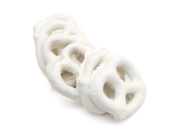 istock White chocolate covered pretzels on white background 1613042542