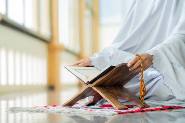 istock The Holy Al Quran with written Arabic calligraphy 1613049572