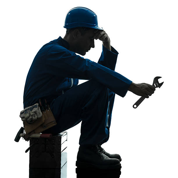 repair man worker sad fatigue failure silhouette one caucasian repairman worker sad fatigue failure  silhouette in studio on white background custodian silhouette stock pictures, royalty-free photos & images