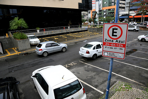 salvador, bahia, brazil - august 11, 2023: traffic signs indicate parking regulated by blue zone on a street in the city of Salvador.