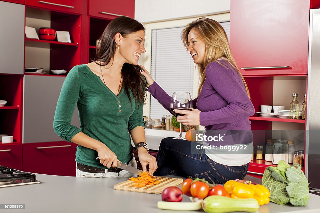 Young women in the kitchen 20-29 Years Stock Photo