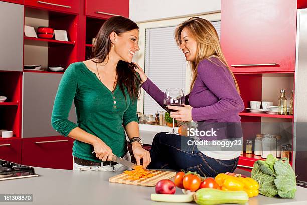 Young Women In The Kitchen Stock Photo - Download Image Now - 20-29 Years, Adult, Adults Only