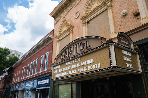 Macon, Georgia USA - June 16, 2023: Cityscape scene with vintage Capitol theatre architecture in the historic downtown district