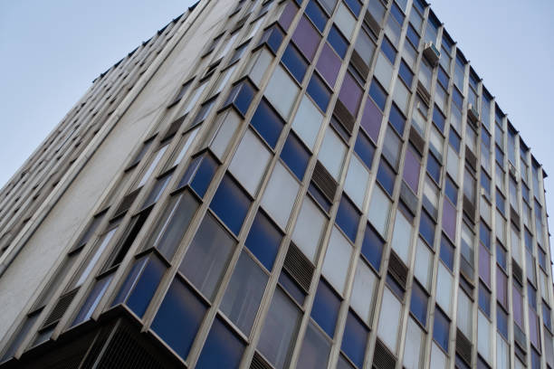 istock perspective of modern building with cool colors 1613216791