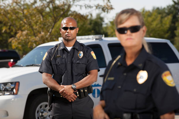 istock Police Partners focus on Male Officer 161323031