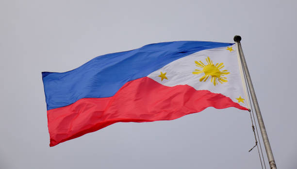 istock Philippines flag waving in the sky 1613230547