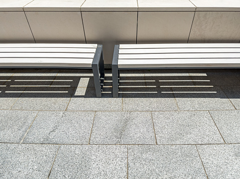 modern street bench near office building. urban architectural minimalism.