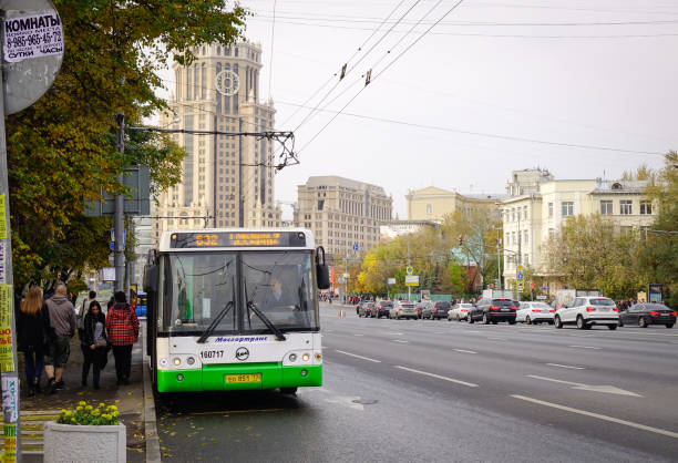 Moscow, Russia - Oct 3, 2016. A bus stopping on street in Moscow, Russia. Moscow is a major political, economic, cultural, and scientific center of Russia.