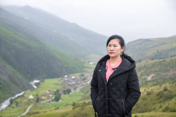istock A mountain woman in the rain 1613307131