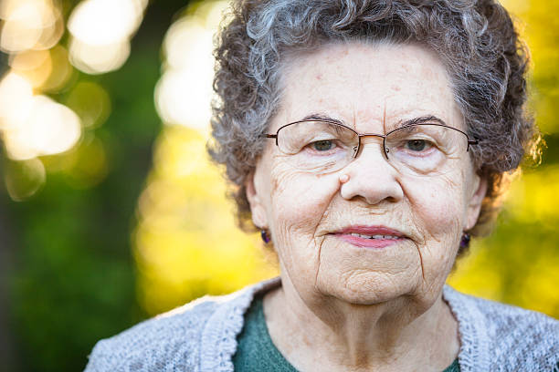 istock Old woman toothy smile 161331771