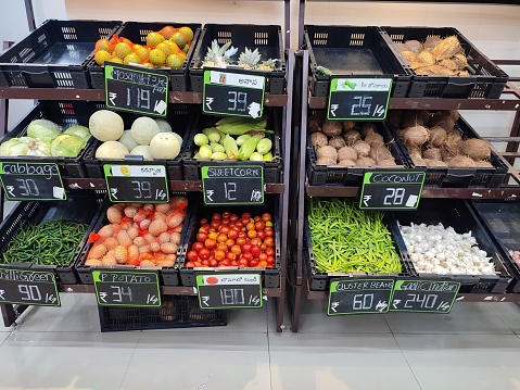 Closeup view of fresh vegetables arranged in a supermarket