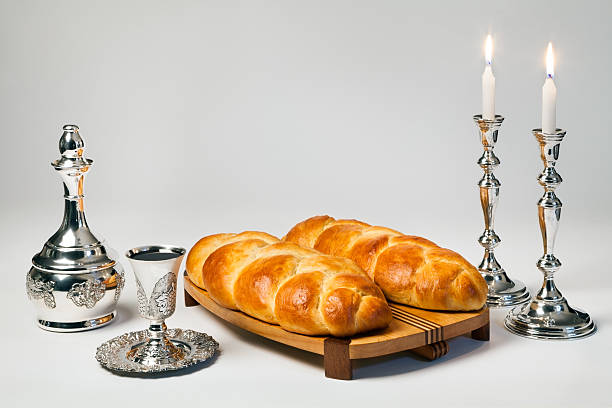 Shabbat Wine, challah and candles for the Jewish Sabbath. jewish sabbath photos stock pictures, royalty-free photos & images