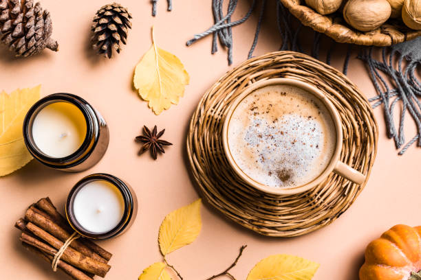 istock Autumn background with pumpkin spice coffee 1613336125