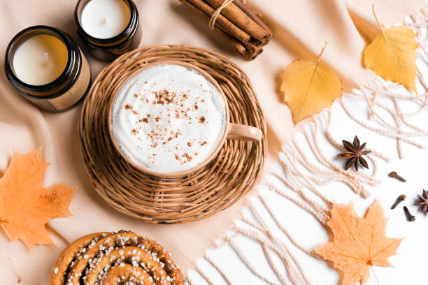istock Autumn background with coffee and leaves 1613341984