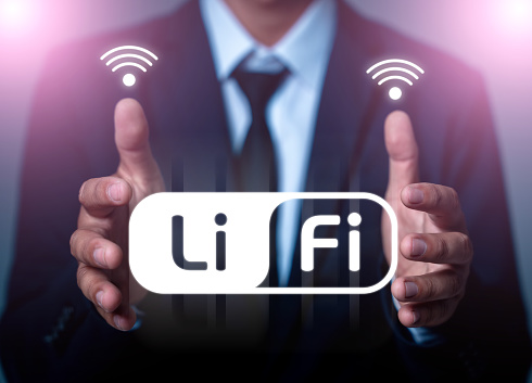 LiFi (Light Fidelity), Businessman showing new technology for internet connection on he hand. Business, technology, internet and networking concept, businessman showing hologram hi-speed connection.