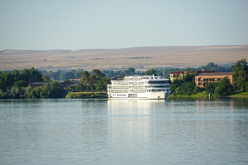 Richland, WA - July 28, 2023: Cruise ship docked at Howard Amon Park in Tri-Cities Washington along the Columbia River