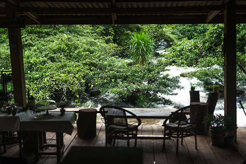 Riverside terrace and chairs and relaxation with nature.