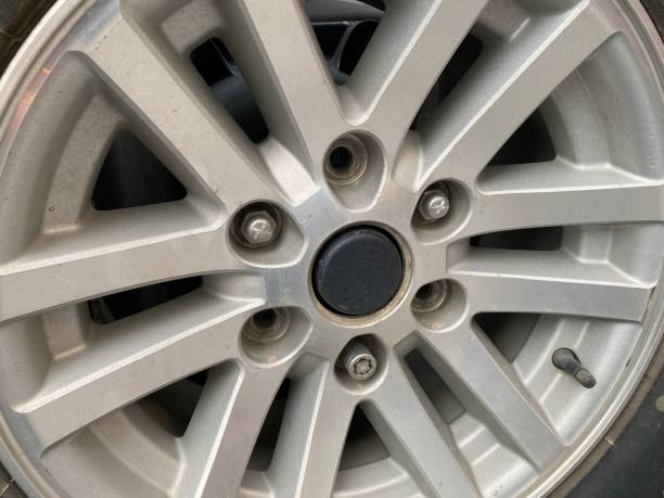 istock Close up of a modern sport wheel with missing nuts 1613345560