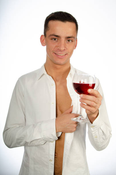 Woman holding glass of rose wine