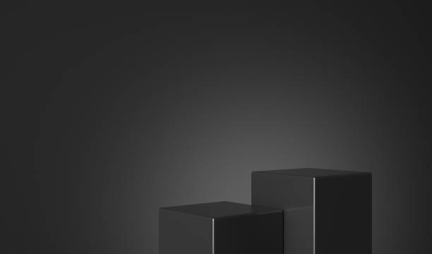 istock Blank platform, podium or pedestal for product display. Black cubes on dark background. 1613504718