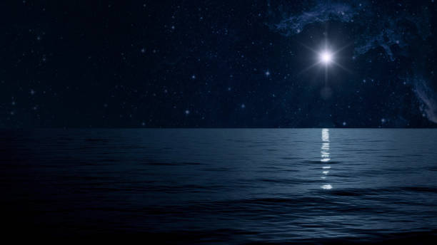 istock The moon shines on the sea 1613580038
