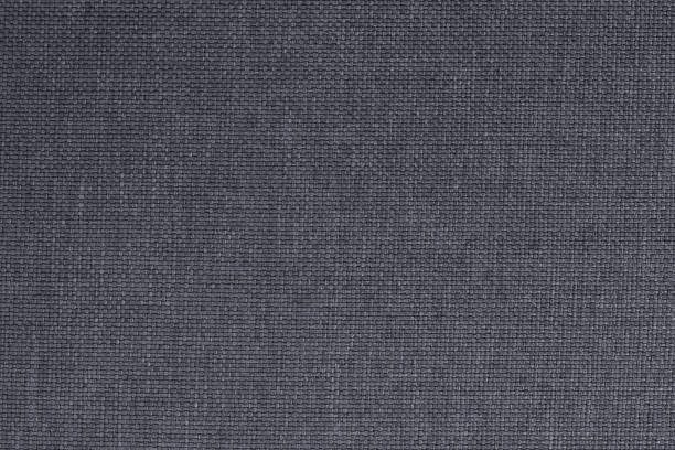 istock Dark grey fabric texture background, seamless pattern of natural textile. 1613581657