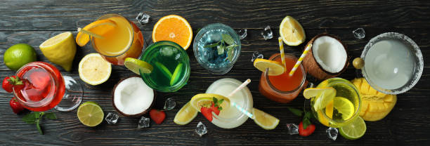 istock Fresh summer cocktails on rustic wooden table 1613585750