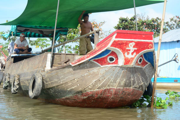 Mekong River, Tien Giang, Vietnam-September 8, 2018: Cargo barge on the Mekong River Delta, Vietnam.