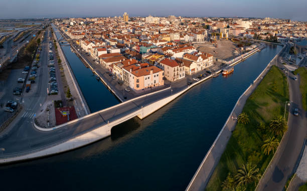 istock Aveiro, its channels navigated by colorful moliceiro boats 1613587638