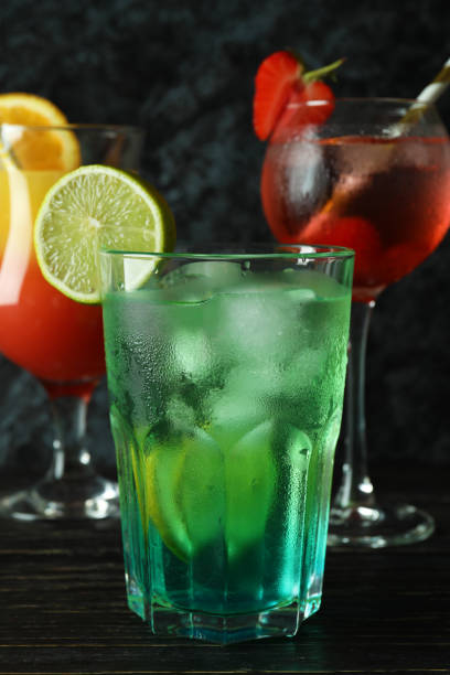 istock Fresh summer cocktails on wooden rustic table 1613589314