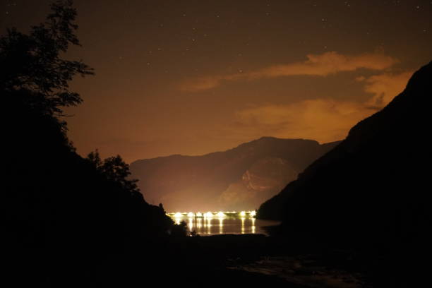 istock night view of dam and starry black sky 1613613528