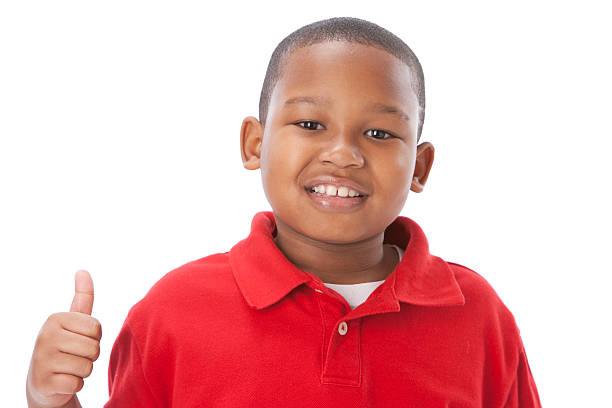 istock Real People: Headshot African American Boy Thumbs Up Approval 161361836