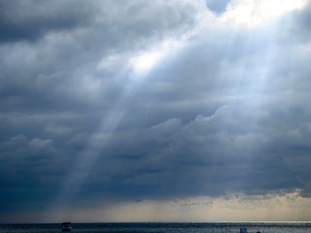 istock the sun horizon lights up the stage through the clouds 1613629545