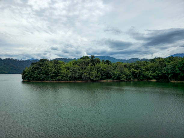 istock Mountain river in river valley. Summer river bank with blue sky and white clouds. River landscape in Kuala Kubu Baru, Selangor, Malaysia 1613634077