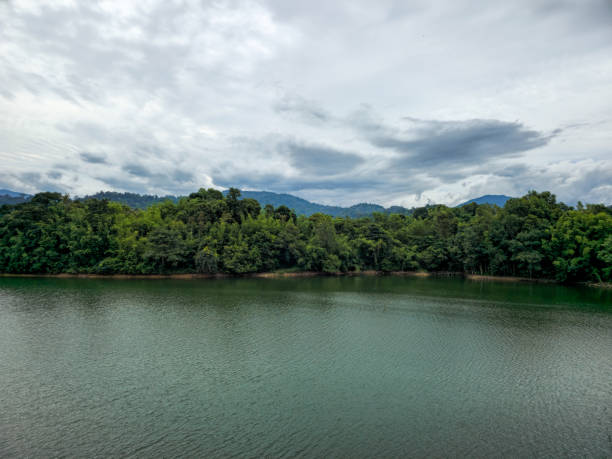 istock Mountain river in river valley. Summer river bank with blue sky and white clouds. River landscape in Kuala Kubu Baru, Selangor, Malaysia 1613634632