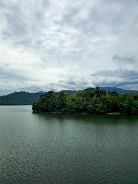 istock Mountain river in river valley. Summer river bank with blue sky and white clouds. River landscape in Kuala Kubu Baru, Selangor, Malaysia 1613637822