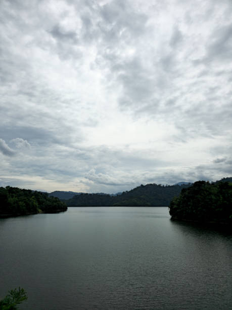 istock Mountain river in river valley. Summer river bank with blue sky and white clouds. River landscape in Kuala Kubu Baru, Selangor, Malaysia 1613639118