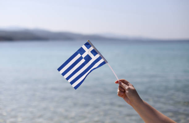istock Greek flag in the wind 1613687028