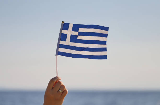 istock Greek flag in the wind 1613687062